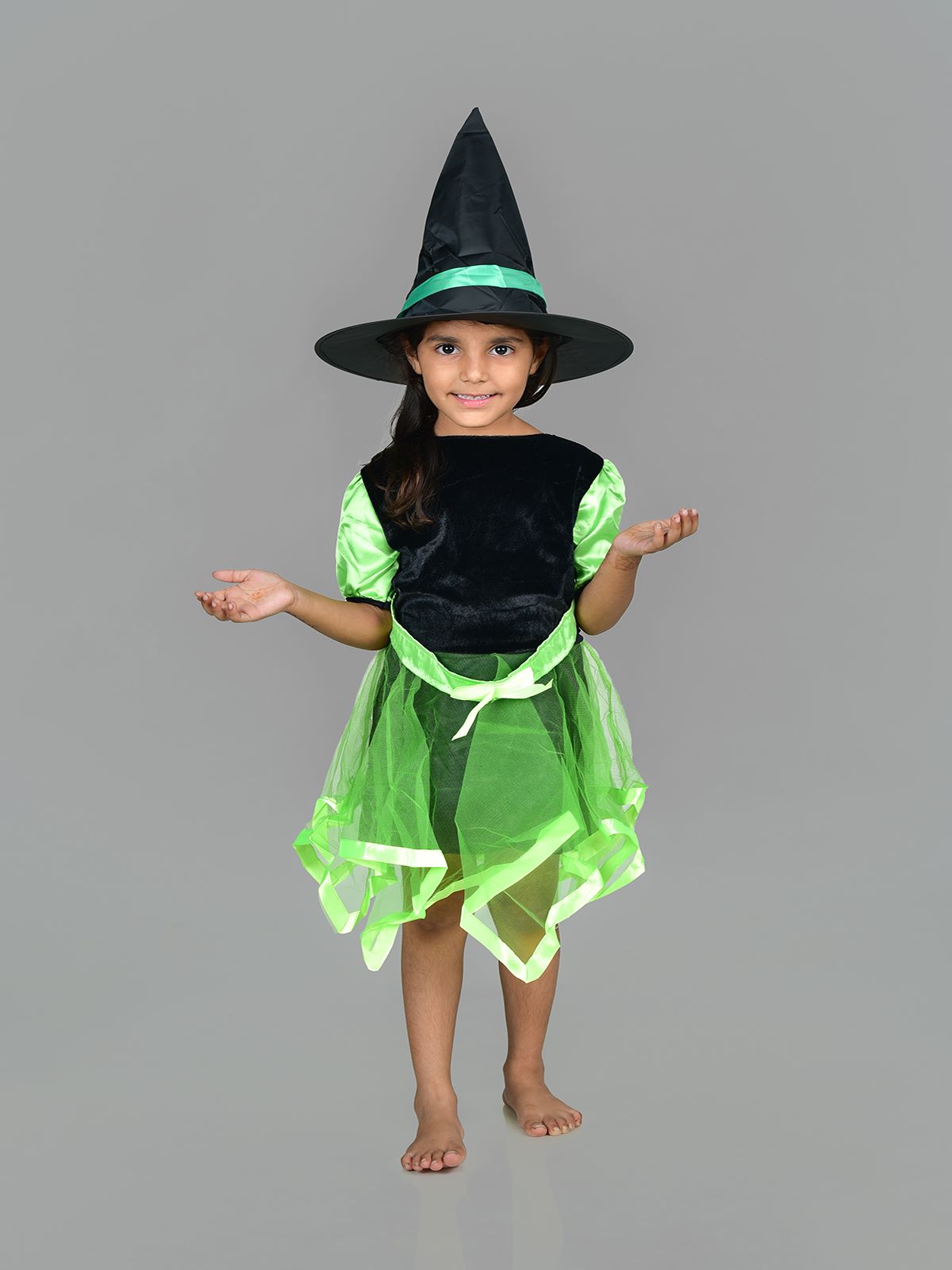 A beautiful sexy girl witch in a black dress and pride sits in halloween  theme. 13076775 Stock Photo at Vecteezy